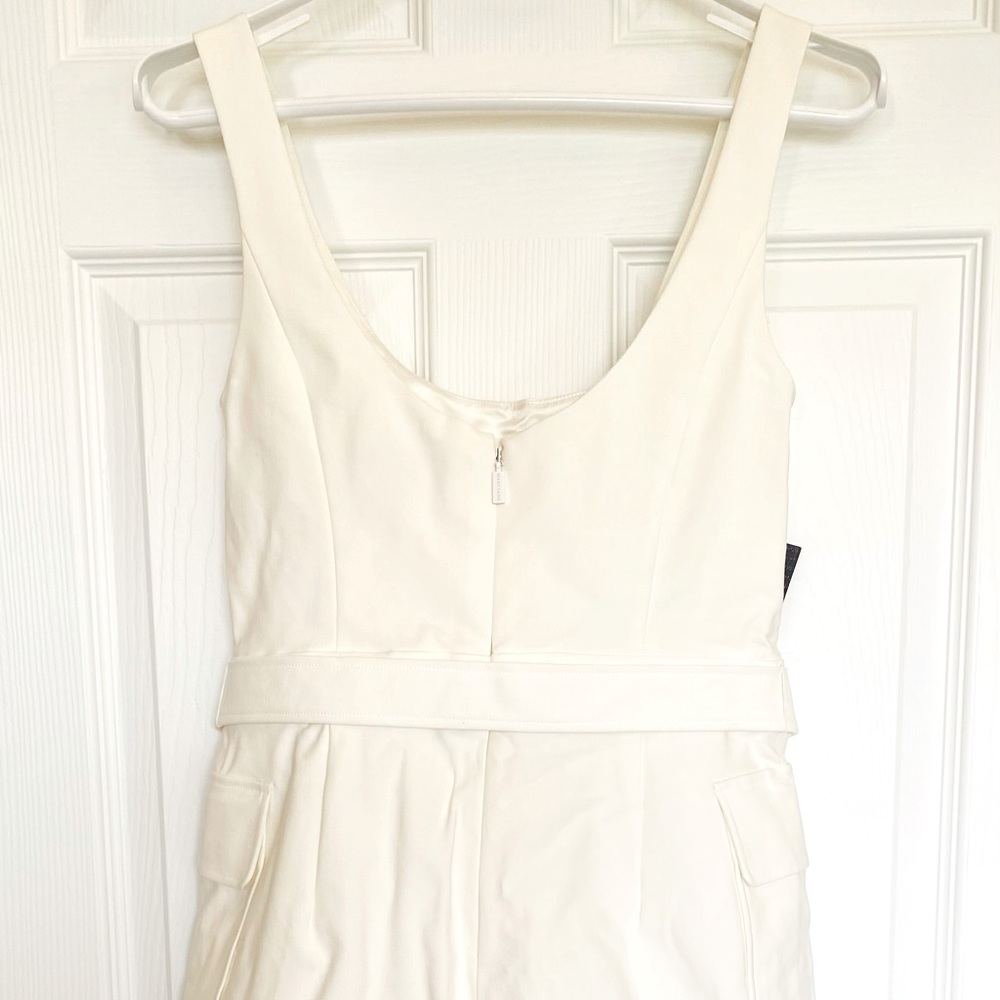 Bebe Marciano White Romper with belt and pockets